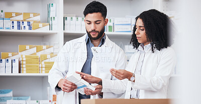 Buy stock photo Healthcare, medicine and a pharmacy team with a box of prescription or chronic medication in a drugstore. Medical, pharmaceutical product and a pharmacist in a clinic with a colleague for health
