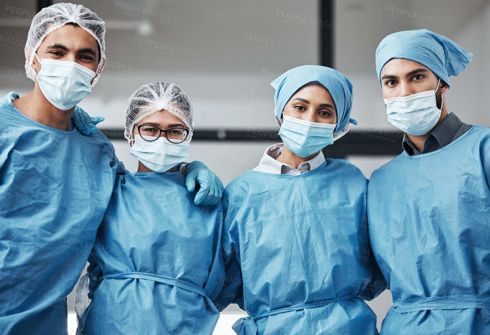 Buy stock photo Support, portrait and doctors with face mask for surgery, healthcare and work in theater. Together, hospital and group of surgeons with a hug for medical collaboration, teamwork and cardiology