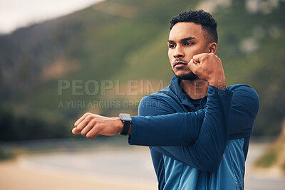 Buy stock photo Runner man, stretching arms and mountain with thinking for fitness, health or wellness in street. Young guy, outdoor and start training in morning for marathon with idea, vision and warm up in nature