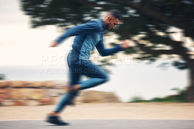 Buy stock photo Runner man, sprint and motion blur in street, nature and profile for speed, fitness and exercise. Athlete guy, fast run and outdoor on road for workout, training and sport for health in countryside
