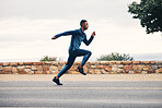 Runner man, sprint and outdoor in street, nature and profile for speed, fitness and exercise. Athlete guy, fast running and vision on road for workout, training and sports for health in countryside