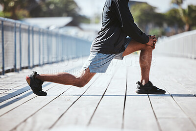 Buy stock photo Closeup, city and man stretching, legs and training with warm up, sports and workout with wellness. Zoom, healthy person and runner with exercise, stretch and energy with fitness, challenge and lunge