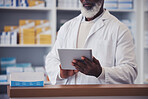 Hands, senior man and pharmacist with digital tablet for medicine inventory and pills database in pharmacy. Closeup, person and healthcare with internet technology for supply chain and research