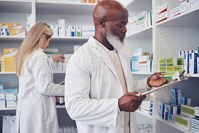 Buy stock photo Pharmacy product, clipboard and mature black man reading medicine label, prescription information or search shop shelf. Hospital inventory, box and African healthcare expert check stock checklist