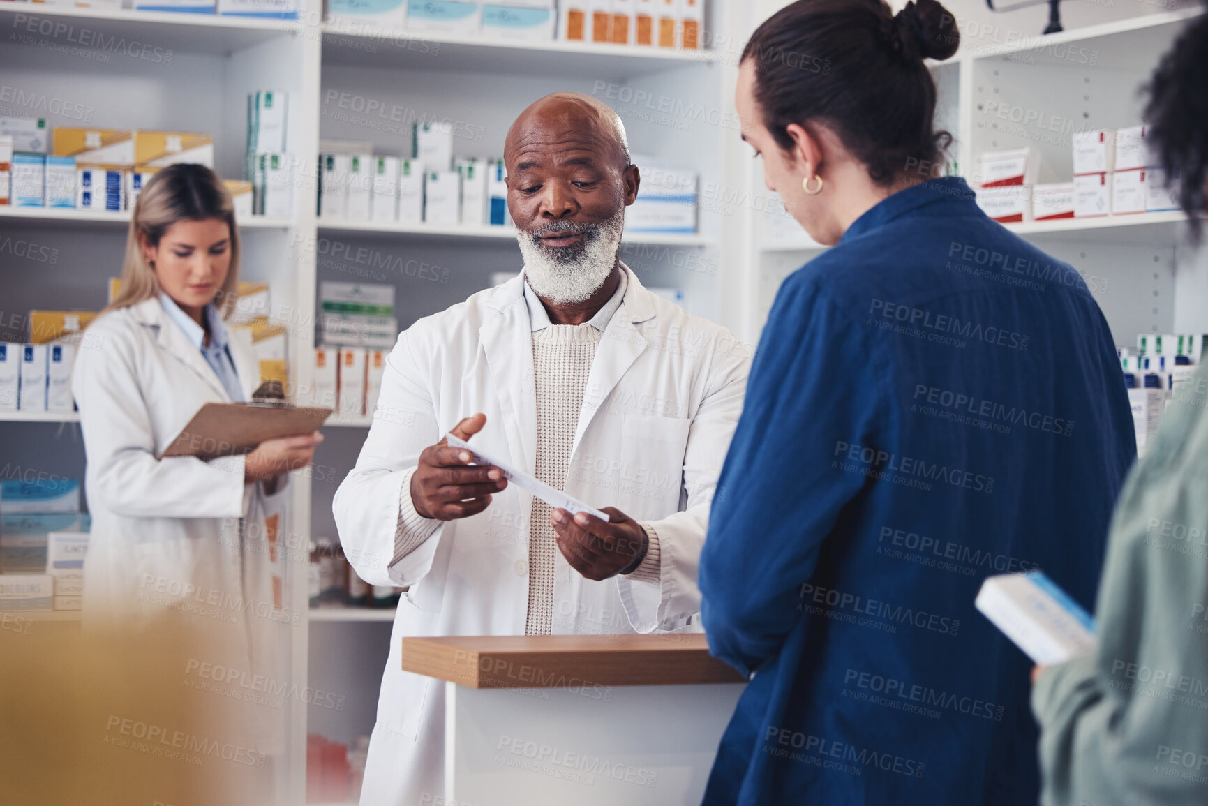 Buy stock photo Pharmacy, customer or mature pharmacist explain prescription paper, medicine information or healthcare receipt. Store clinic, hospital conversation or black man consulting patient over medical choice