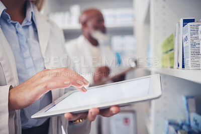 Buy stock photo Closeup, pharmacy and hands with a tablet for inspection, check of stock or medicine update online. Email, connection and a medical employee typing on technology for healthcare inventory at a clinic