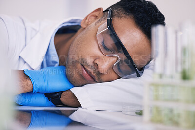 Buy stock photo Scientist, man sleeping and tired in laboratory for plants research, medicine and pharmaceutical study at table. Medical or science person with career dream, fatigue and depression by green test tube