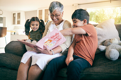 Buy stock photo Happy kids, smile or grandmother reading a book for learning, education or storytelling on sofa at home. Family, senior or grandma with children siblings for a fantasy story to enjoy bonding together