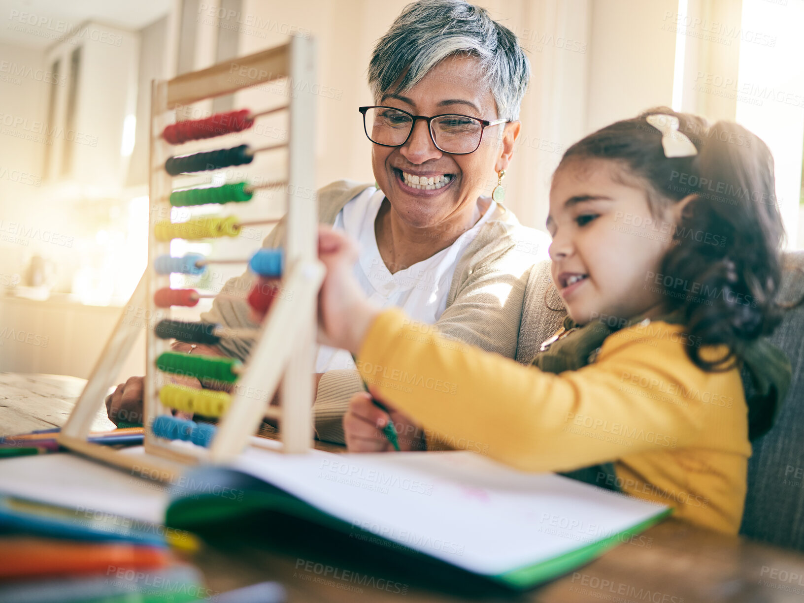 Buy stock photo Education, family and child with grandmother, abacus or counting, project or homeschool, kindergarten or lesson. Learning, math and happy kid with grandma in living room help, teaching or development