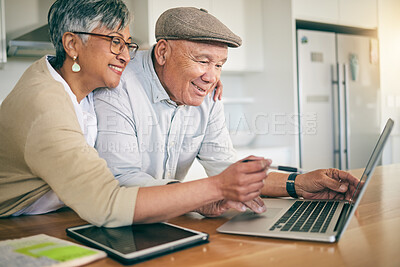Buy stock photo Laptop, happy and mature couple at table in home kitchen, social media and internet for bonding together. Computer, smile of man and woman online, reading email and website for news in retirement.