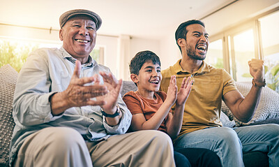 Buy stock photo Father, grandfather and child watching tv and celebrate on home sofa for broadcast, live goal and support. Boy kid, senior man and parent together as male family team and clap as excited esports fan
