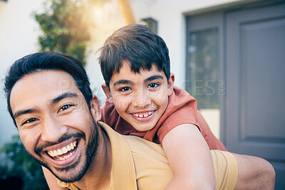 Buy stock photo Face, smile and father piggyback child by home, bonding and excited together. Portrait, kid and dad carrying boy, funny laugh and happy with care, play and support for healthy connection of family