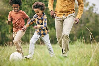 Buy stock photo Family, ball and a boy playing soccer on a field outdoor for fun together with his happy brother. Football, fitness or game with a father and children running on grass for sport or physical activity