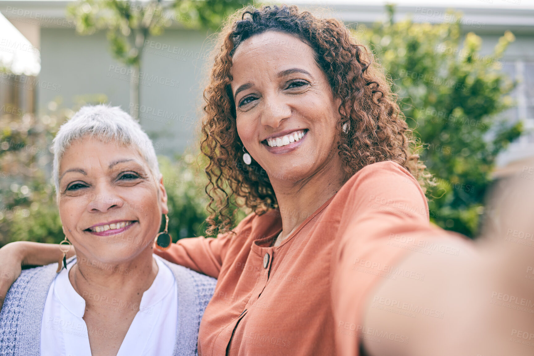 Buy stock photo Portrait, senior mother or happy woman take a selfie in garden as a family to relax on holiday together. Smile, faces or mature mom taking picture or photograph with her excited daughter in home