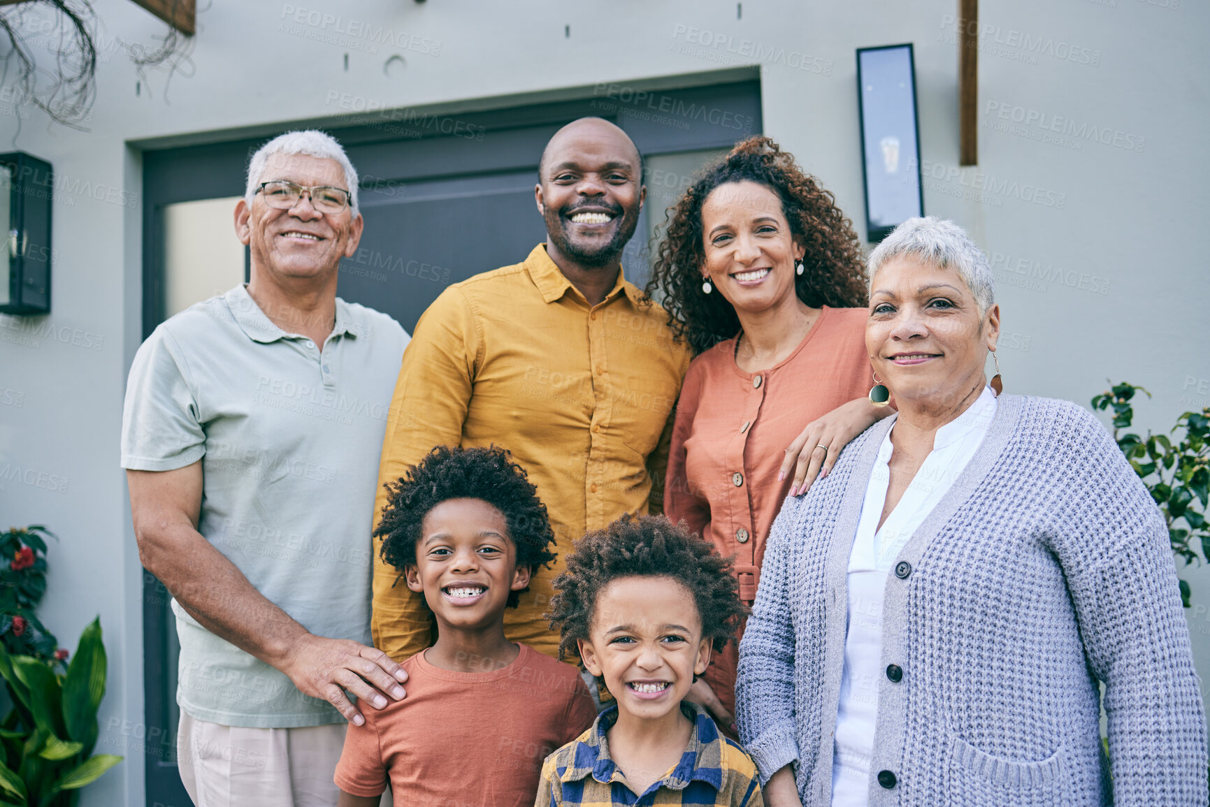 Buy stock photo Portrait, smile and big family by home, interracial and having fun together at backyard. Face, grandparents and children, mother and father happy for bonding in connection, love and care at house.