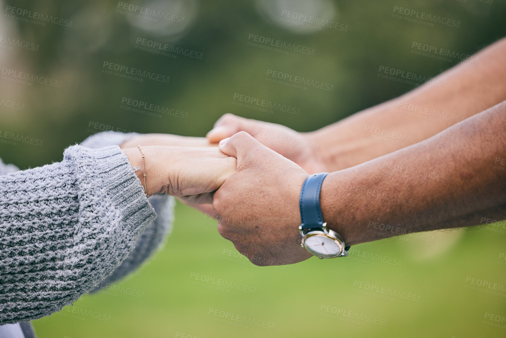 Buy stock photo Outdoor, closeup and couple holding hands, love or support with comfort, romance or trust. People, man or woman outside, lovers or care with bonding, romantic or marriage with relationship or loyalty