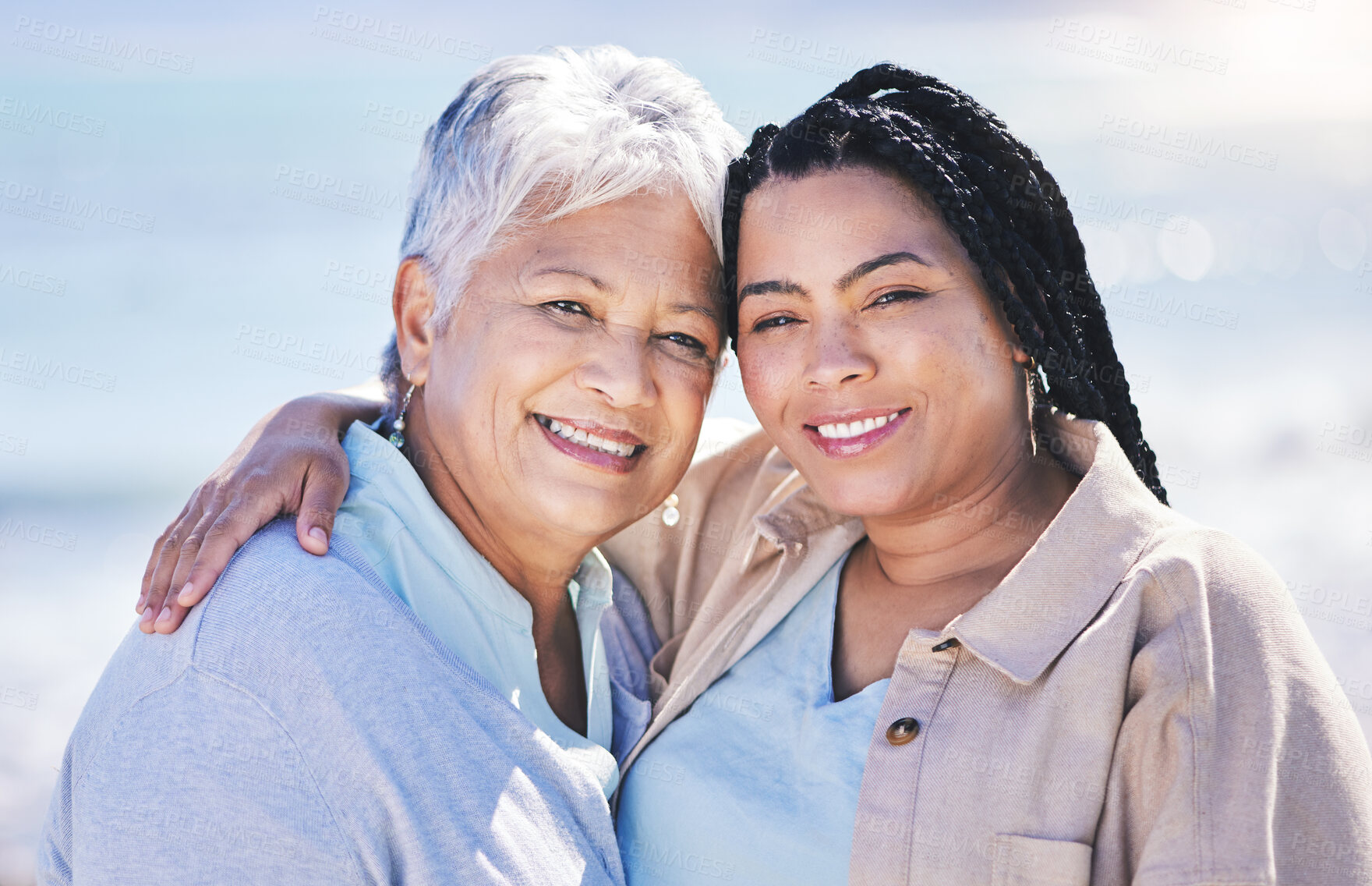 Buy stock photo Portrait, beach, mother and daughter, hug and family with vacation, support and summer break. Face, elderly mama and parent with girl, seaside holiday and embrace with travel, ocean trip and getaway