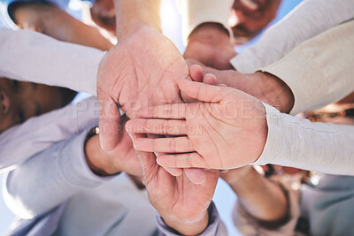 Buy stock photo Stack of hands, diversity and people in collaboration for global support and success. Teamwork, palm and low angle of group of friends with positive vision, trust and love for team building outdoors.