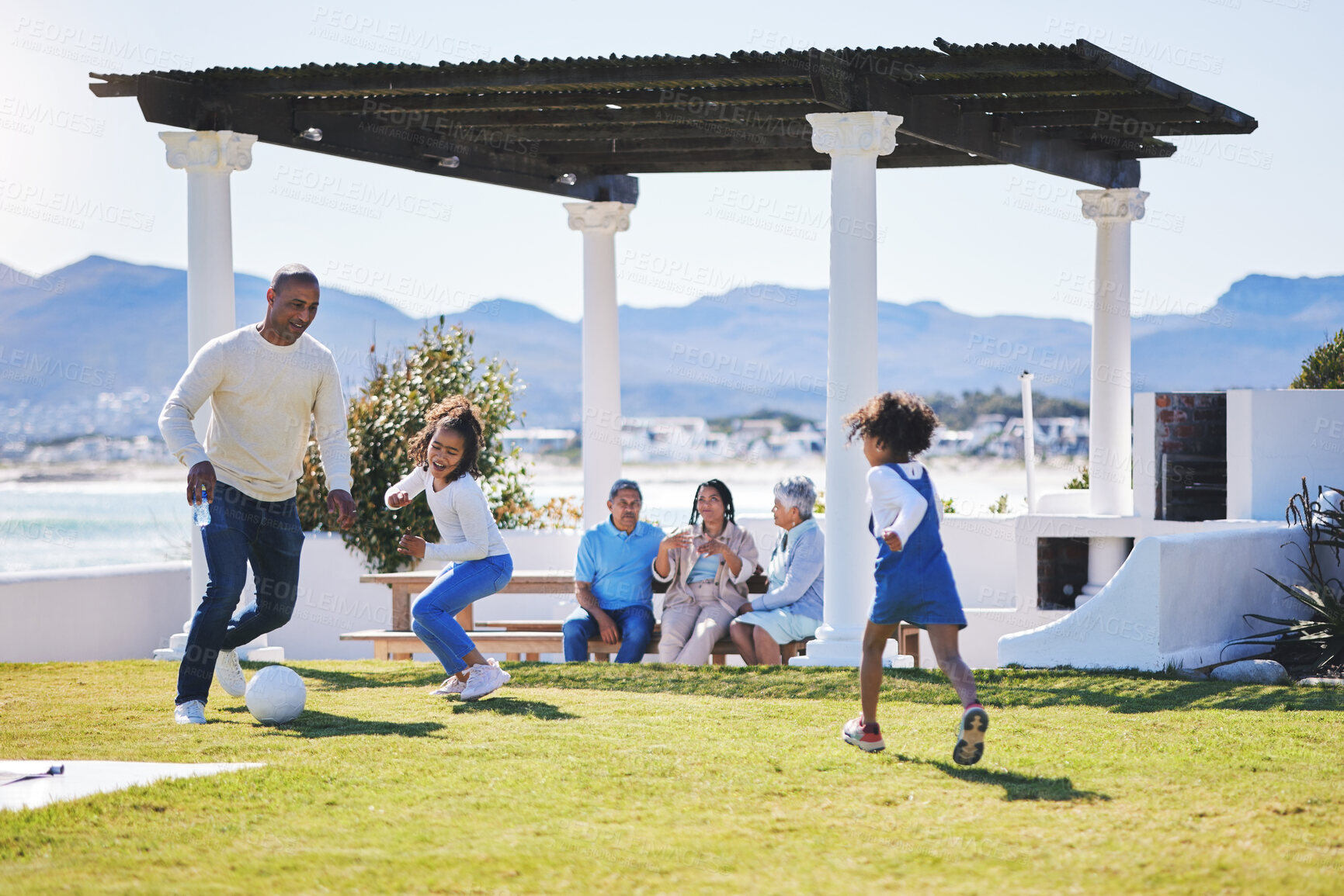 Buy stock photo Father, kids and soccer on backyard grass, relax or bonding for love, sports and playing on vacation in summer. Dad girl children and football game on lawn, field or garden with freedom on holiday