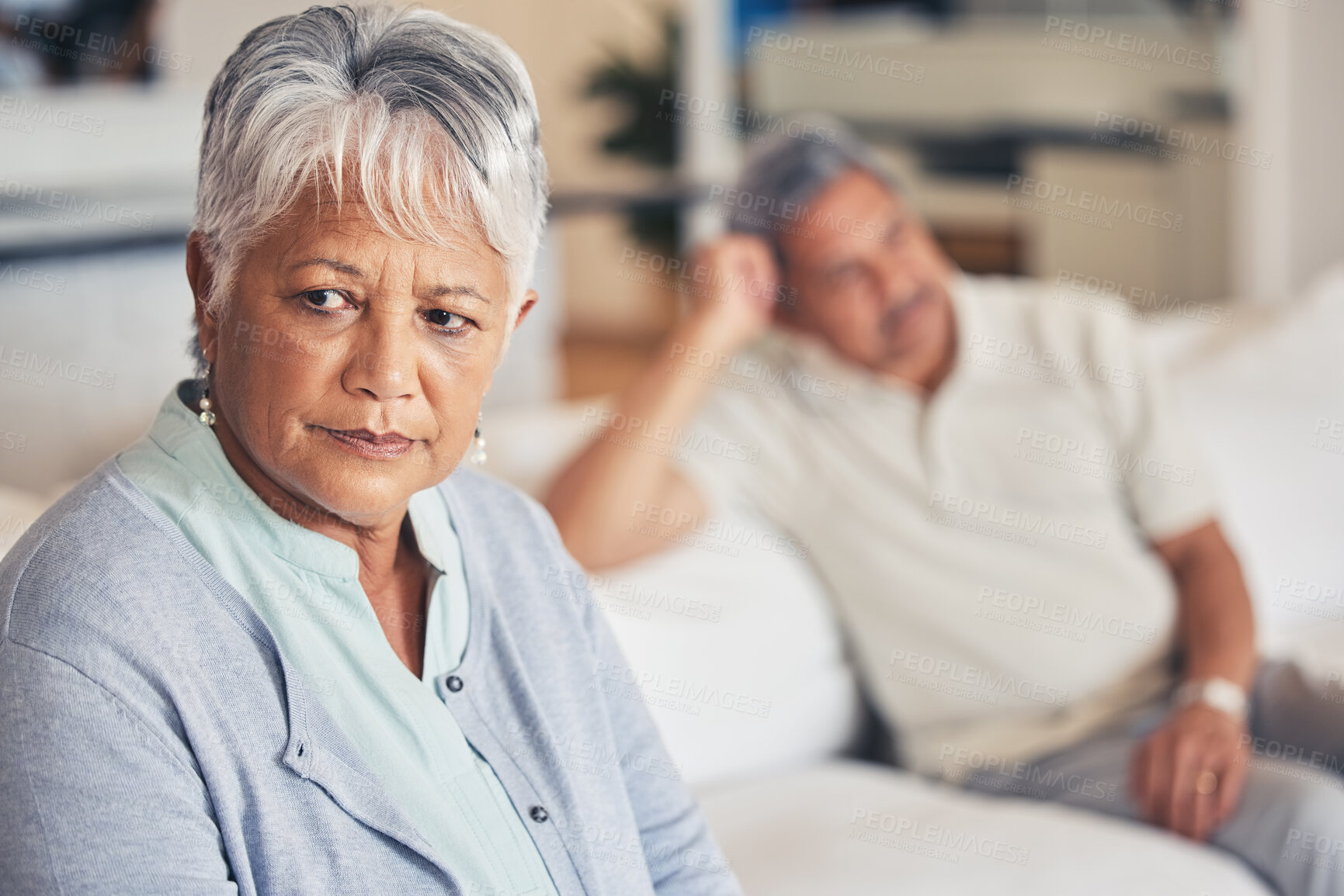 Buy stock photo Frustrated senior couple, fight and divorce in conflict, argument or disagreement on living room sofa at home. Unhappy woman and man in cheating affair, toxic relationship or breakup dispute in house