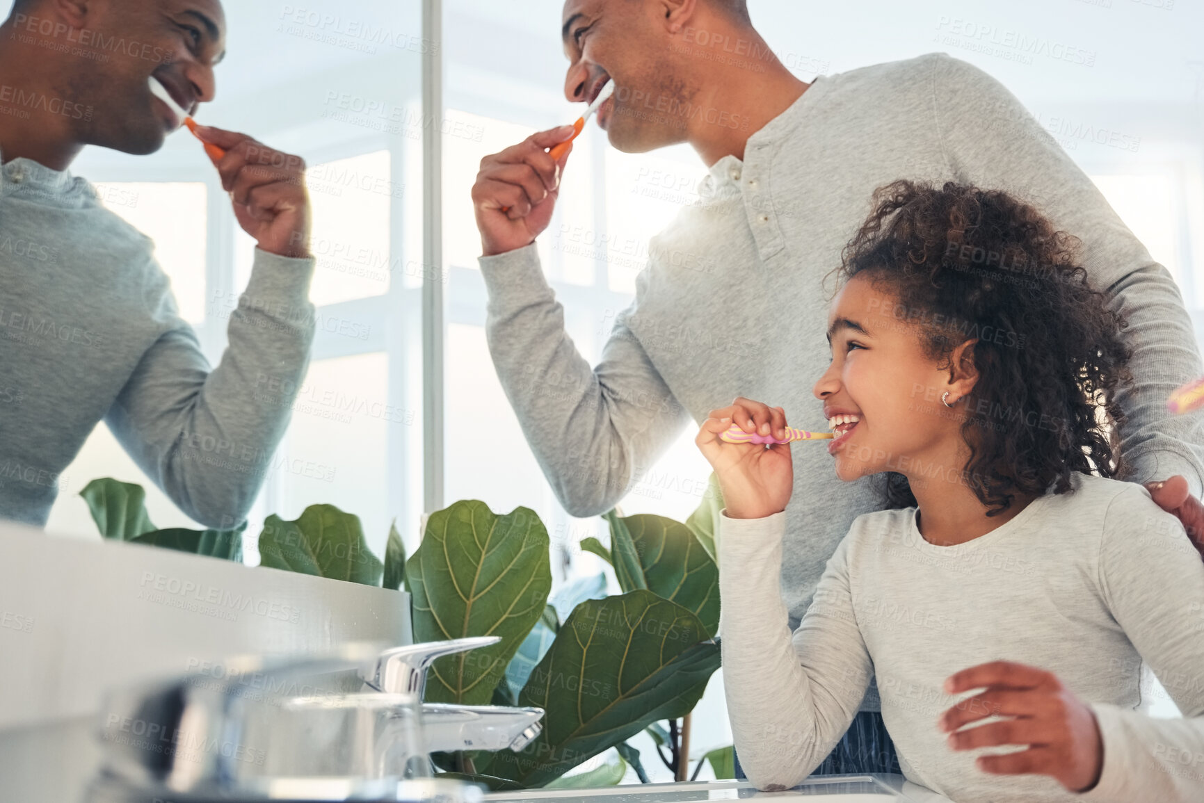 Buy stock photo Dad, girl and kid brushing teeth in bathroom for hygiene, morning routine or learning healthy oral habits. Happy father, child and dental cleaning at mirror with toothbrush, self care or fresh breath