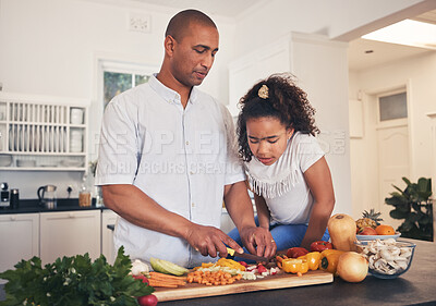 Buy stock photo Father, teaching or child cooking healthy food in kitchen in preparation for a vegan diet for dinner together. Education, dad or kid learning vegetable salad recipe at home for lunch or development