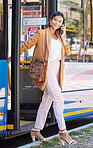 Travel, phone call and happy woman at the bus stop, public transport service and person chat on commute  to work. Corporate, worker or talking on cellphone with connection or transportation on metro