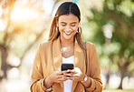 Happy woman, phone and typing in nature for social media, communication or outdoor networking. Female person smile on mobile smartphone app for online chatting, texting or research at the park