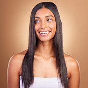 Texture, hair and skincare with face of woman in studio for keratin, salon  treatment and beauty. Shampoo, health and growth with Indian model on brown  background for glamour, shine and hairstyle