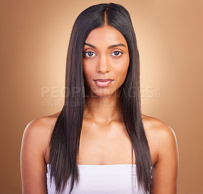 Buy stock photo Portrait, hair care and woman with beauty, skincare and dermatology on a brown studio background. Face, person or model with aesthetic, luxury and glow with healthy skin, texture or volume with shine