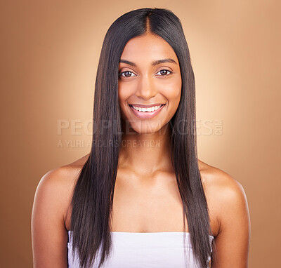 Buy stock photo Portrait, hair care and woman with a smile, shine and skincare on a brown studio background. Face, person and model with happiness, aesthetic or glow with healthy skin, texture and volume with beauty