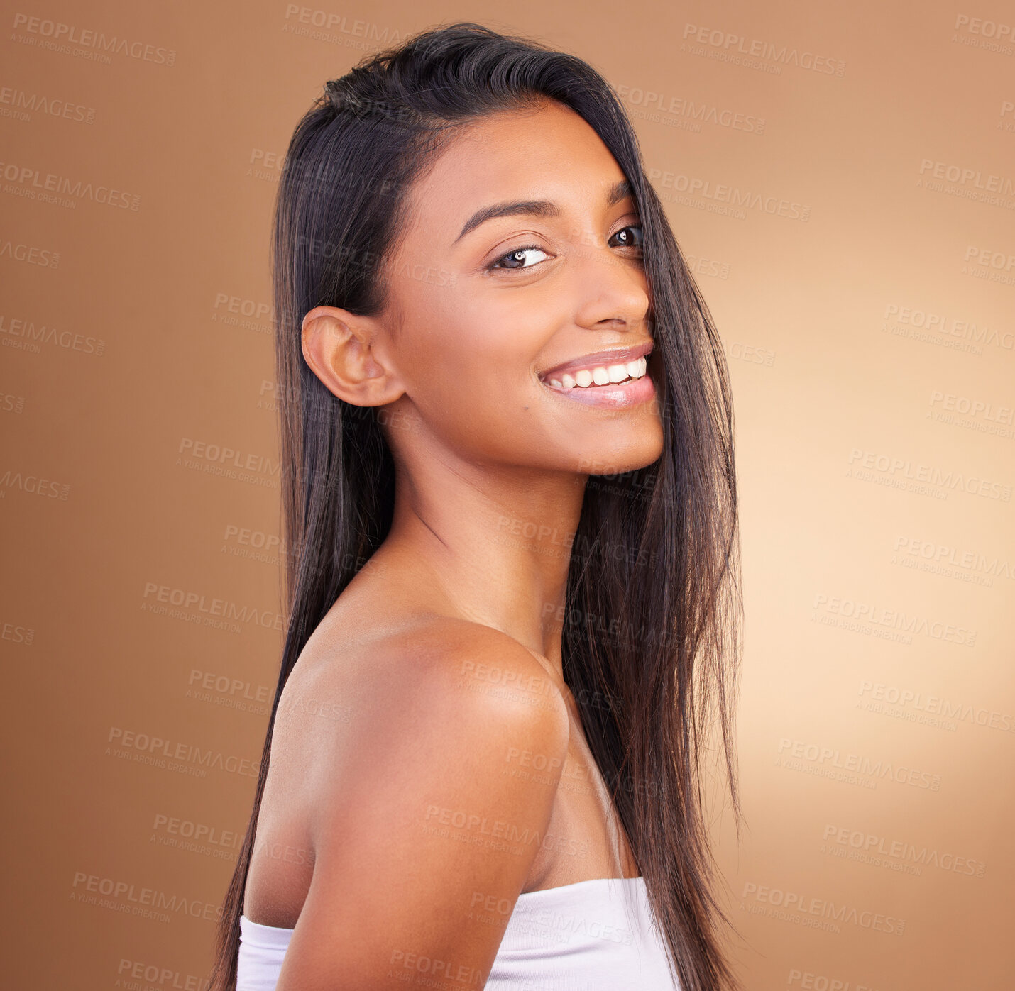 Buy stock photo Portrait, hair care and woman with a smile, beauty and wellness on a brown studio background. Face, person and model with shine, glow and aesthetic with dermatology, shampoo and cosmetics with luxury