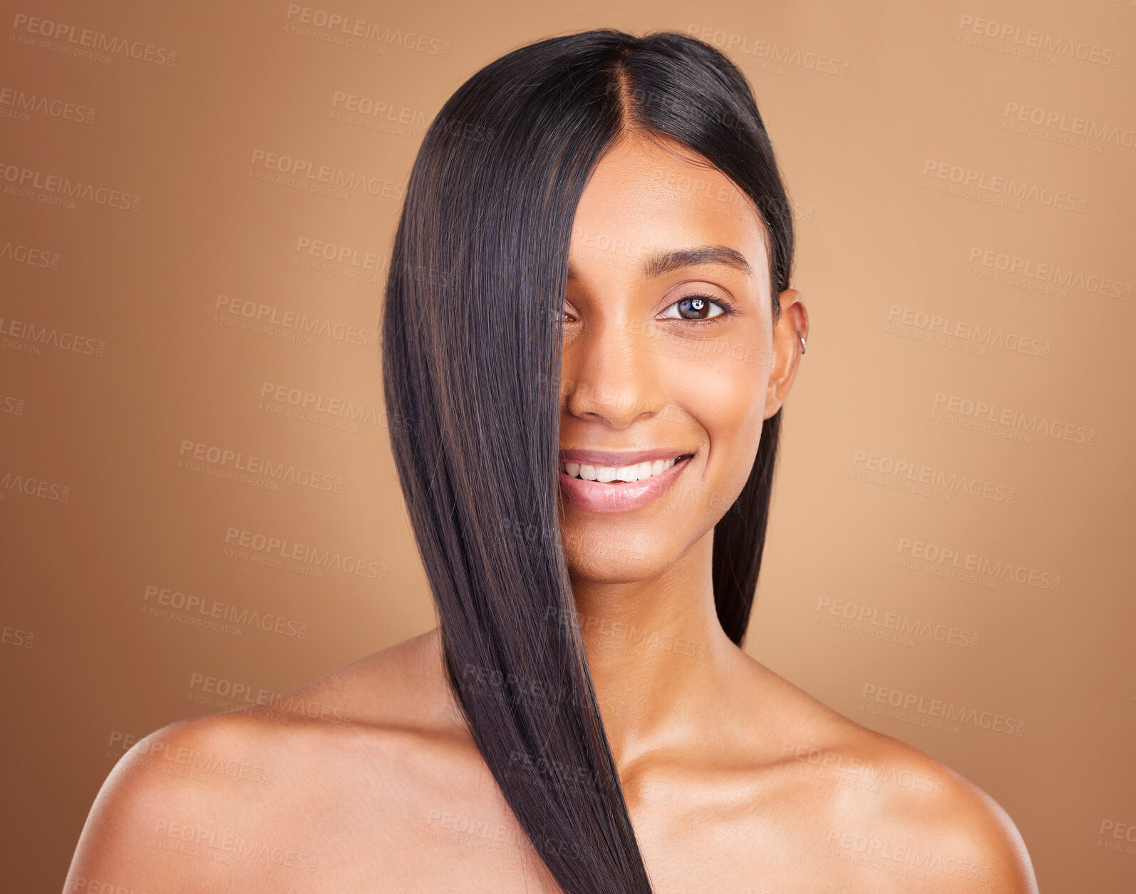 Buy stock photo Portrait, hair care and woman with beauty, shine or dermatology on a brown studio background. Face, person or model with aesthetic, grooming or glow with healthy skin, texture or volume with wellness