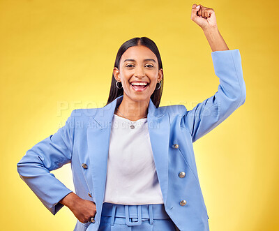 Buy stock photo Fist, success and portrait of business woman in studio for pride, professional and champion. Empowerment, power and strong with person on yellow background for celebration, achievement and winner
