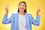 Fashion, peace sign and Indian woman on yellow background with smile, positive attitude and happy. Emoji, business and person in studio for hand gesture in trendy clothes, professional style and suit