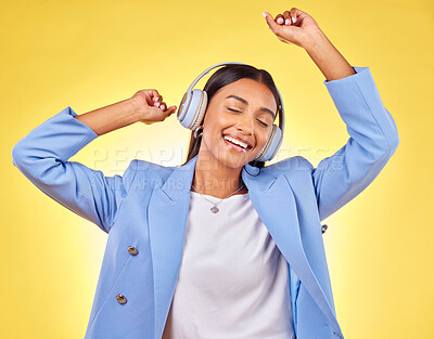 Buy stock photo Dancing, fashion or happy woman streaming music in headphones on yellow background. Relax, smile or calm entrepreneur listening to radio song, album or audio sound on subscription playlist in studio