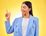 Pointing up, fashion or happy woman by sale, discount deal or retail offer isolated in studio. Smile, advertising or excited designer with mockup space, news or menu promotion on yellow background
