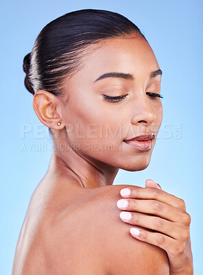 Buy stock photo Woman, natural beauty and relax with skincare, face cleaning and skin glow in studio. Facial, female model and cosmetics with dermatology, self care and collagen treatment with blue background