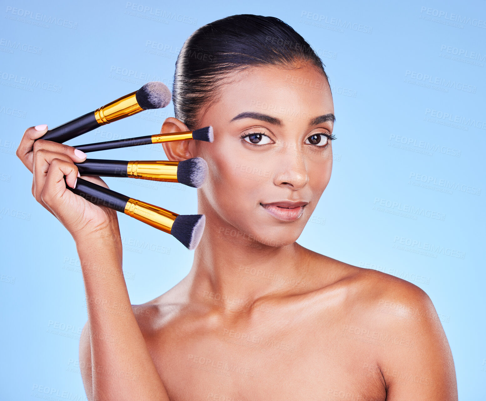 Buy stock photo Makeup, brush and woman, beauty and portrait with cosmetic tools isolated on blue background. Foundation, powder and cosmetology, skin glow and wellness with equipment and grooming in a studio