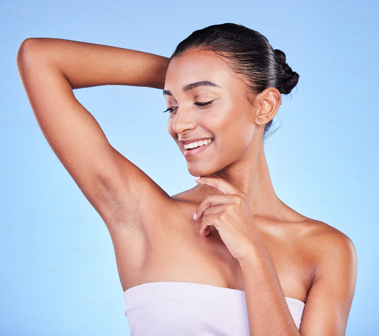 Buy stock photo Body care, smile and woman in studio with armpit, cleaning and BO control on blue background. Smooth skin, hygiene and happy female model with laser, hair removal or underarm treatment satisfaction