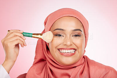 Buy stock photo Makeup, brush and muslim woman portrait with a smile from cosmetics and blush in studio. Facial, glow and happy female person with beauty, skincare and shine with a hijab and skin tool for face