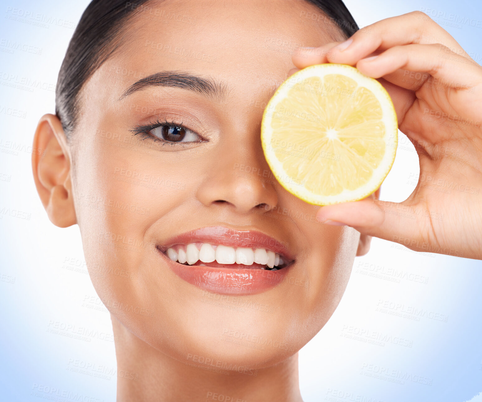 Buy stock photo Beauty skincare, portrait and happy woman with lemon for citrus detox treatment, natural self care or wellness. Vitamin C food, fruit product and studio face of dermatology person on blue background