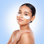 Woman, eye patch and beauty, skincare in portrait with facial isolated on blue background. Face mask, cosmetic product and wellness, dermatology and skin glow with treatment and self care in studio