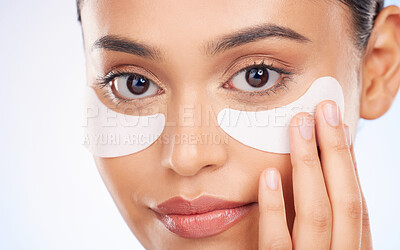 Buy stock photo Portrait, beauty and woman with eye pads for anti aging or skin glow on studio background. Cosmetics, facial detox and face of model with solution or collagen skincare patch for dermatology product.