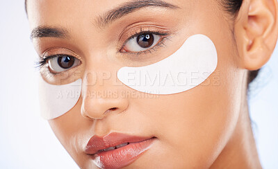 Buy stock photo Portrait, skincare and woman with eye patch for anti aging or skin glow for beauty on studio background. Cosmetics, facial detox and face of model with pads or collagen mask for dermatology product.