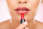 Makeup, mouth and woman with lipstick in studio for application, cosmetic and gloss closeup. Zoom, beauty and female model with color treatment for plump, volume and smooth lips texture promotion