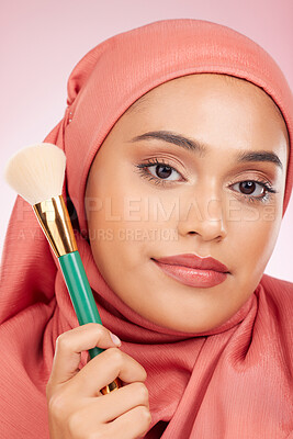 Buy stock photo Makeup, brush tool and muslim woman portrait with a smile from cosmetics and blush in studio. Facial, glow and happy female person with beauty, skincare and shine with a hijab and skin for face