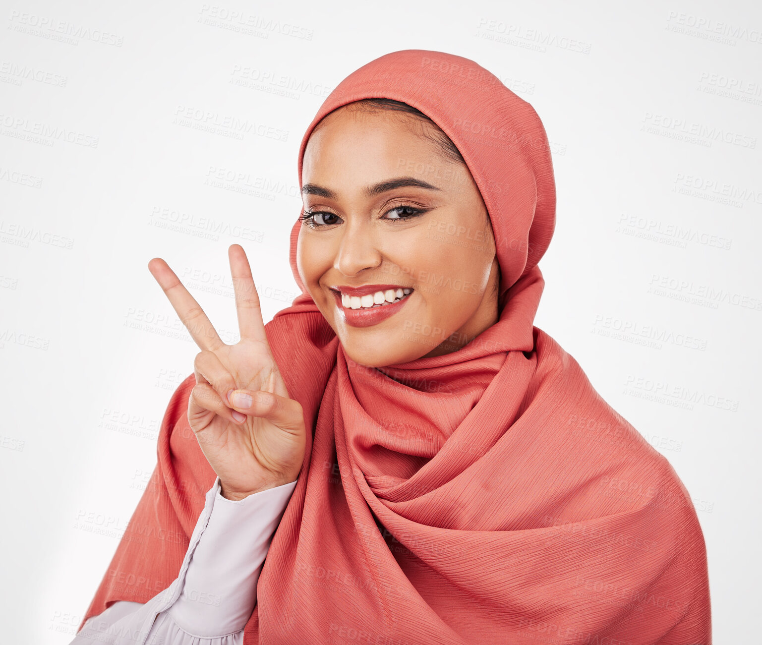 Buy stock photo Peace sign, smile and muslim with portrait of woman in studio for support, kindness and motivation. Happy, emoji and wellness with face of person on white background for excited and v hand gesture