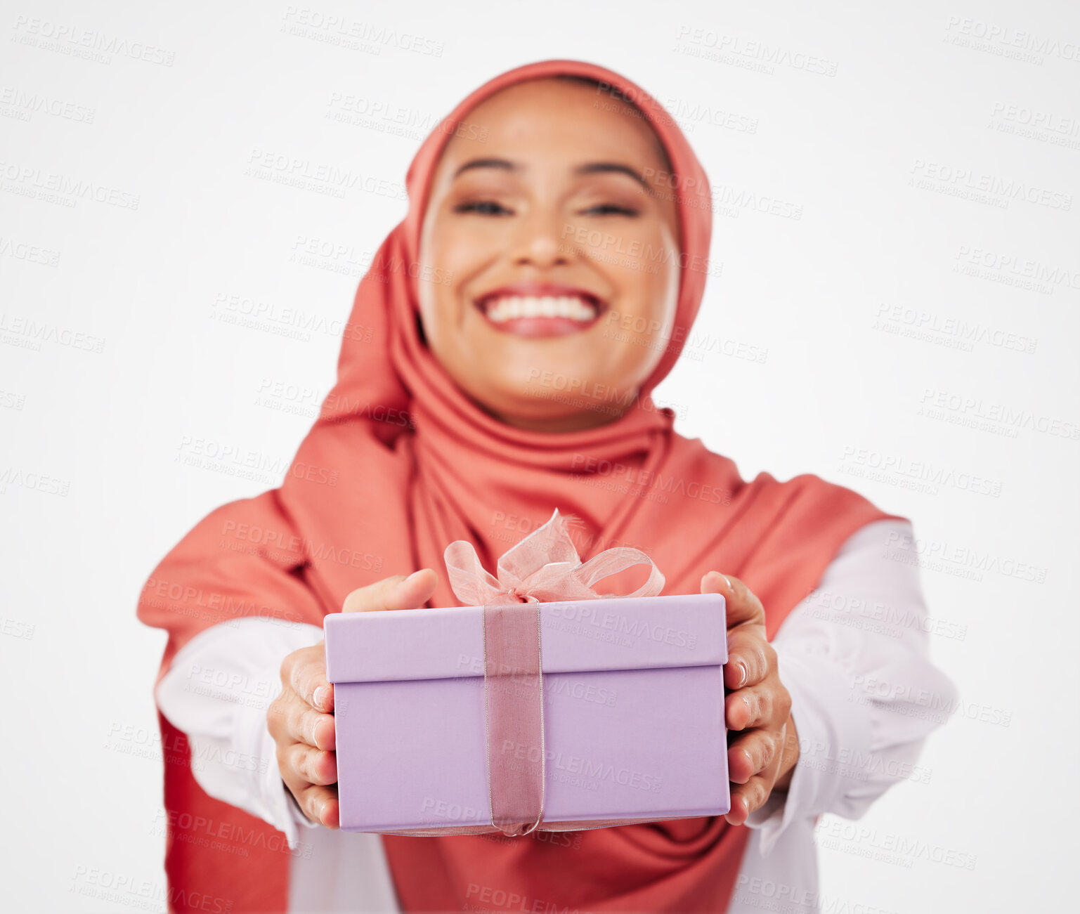 Buy stock photo Woman, winner and gift box, offer or prize for giveaway and shopping on a white background. Muslim person in Saudi Arabia in portrait for present, ribbon package and winning or competition in studio