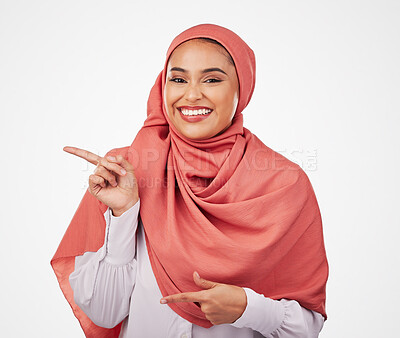 Buy stock photo Muslim, woman and pointing, advertising and presentation with smile in portrait isolated on white background. Business employee in hijab, communication and opportunity, multimedia and offer in studio